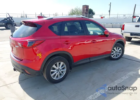 2014 Mazda Cx-5 Touring z USA, uszkodzony, nr VIN JM3KE2CY3E0415576
